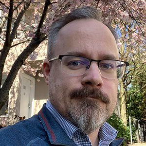 A headshot of Dr. Jim Wharton.